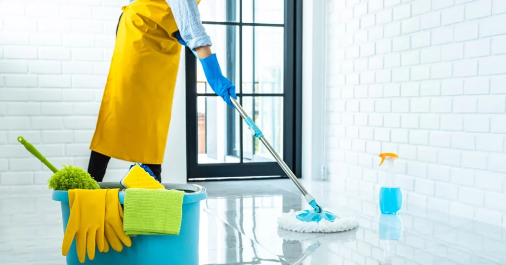 Happy Young Woman Blue Rubber Using Mop While Cleaning Floor Home 1 1024x537