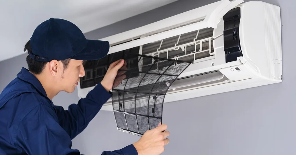 Technician Service Removing Air Filter Air Conditioner Cleaning 1 1024x537